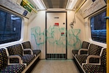 Banksy's latest work sprayed on the inside of a London Underground tube carriage.