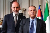 Carlo Cottarelli, right, stands next to Italian President Sergio Mattarella.
