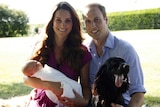 Catherine Middleton and Prince William pose with their son Prince George