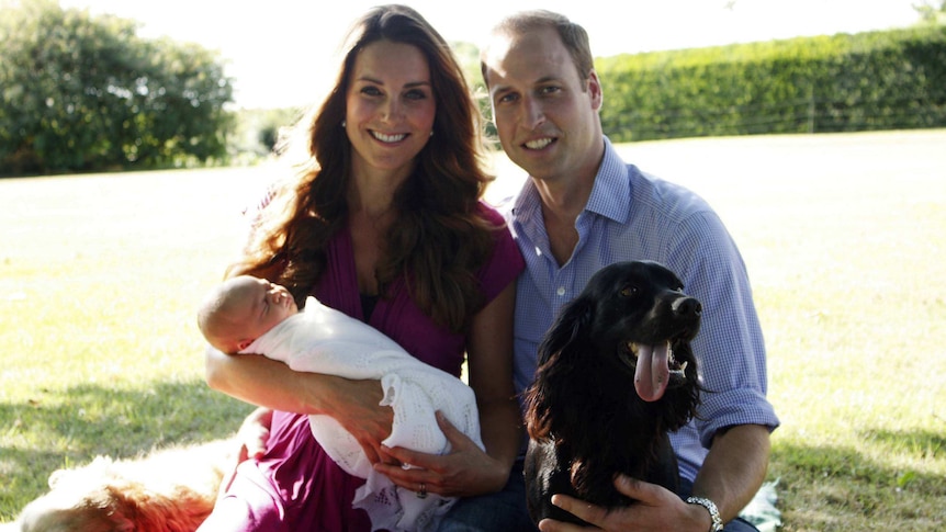 Catherine Middleton and Prince William pose with their son Prince George