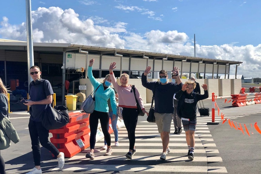 The first passengers arrive at Sunshine Coast Airport since the border reopened.