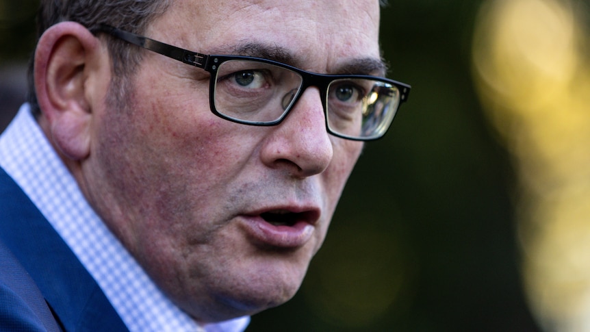 A close-up of Victorian Premier Daniel Andrews with a stern expression