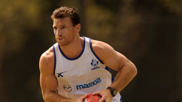 Elder statesman... Brent Harvey will stay on until the end of the 2010 AFL season.