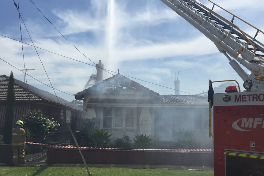 A house in Fairfield in Melbourne's north is seriously damaged by fire