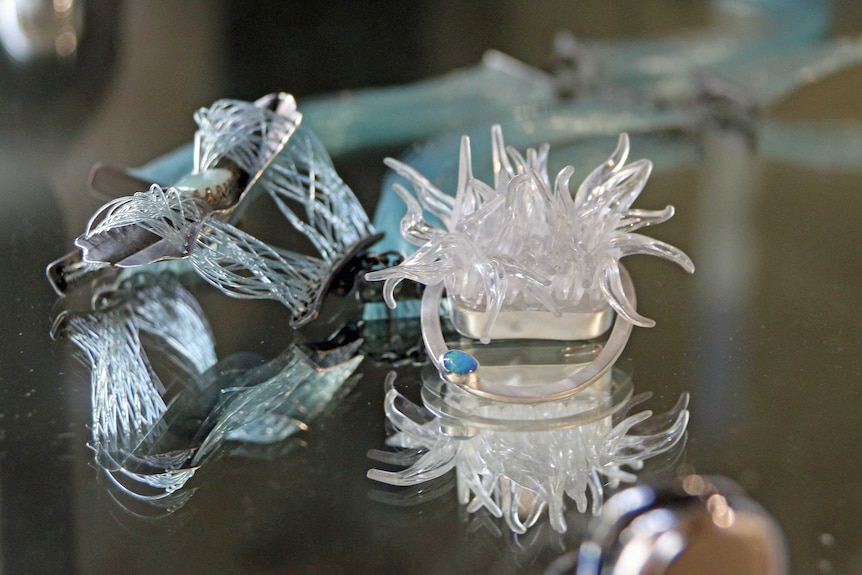 Jewellery is among the works in the exhibition referencing the toll of plastic pollution on seabirds.