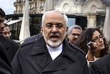 Iran's foreign minister speaks to media during talks in Lausanne