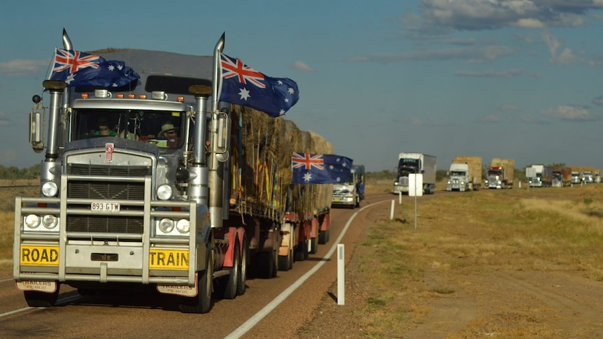Convoy of trucks arrived at Ilfracombe in central-west Queensland as part of the 11th Burrumbuttock Hay Runners event