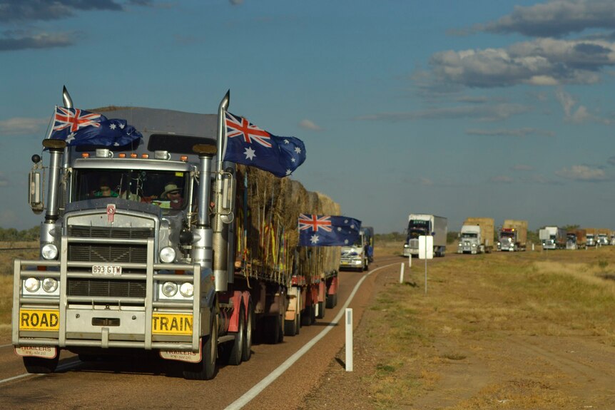 Convoy of trucks arrived at Ilfracombe in central-west Queensland as part of the 11th Burrumbuttock Hay Runners event