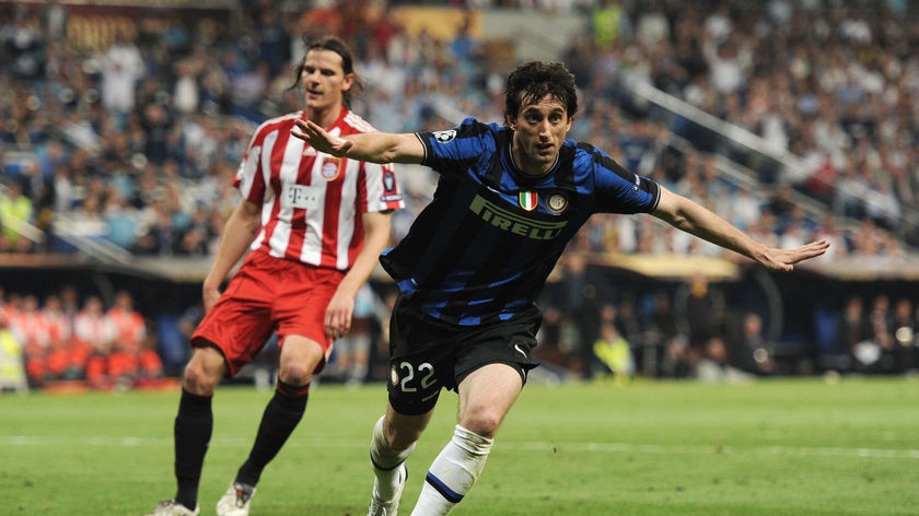 Double trouble: Diego Milito celebrates scoring his second goal for Inter.