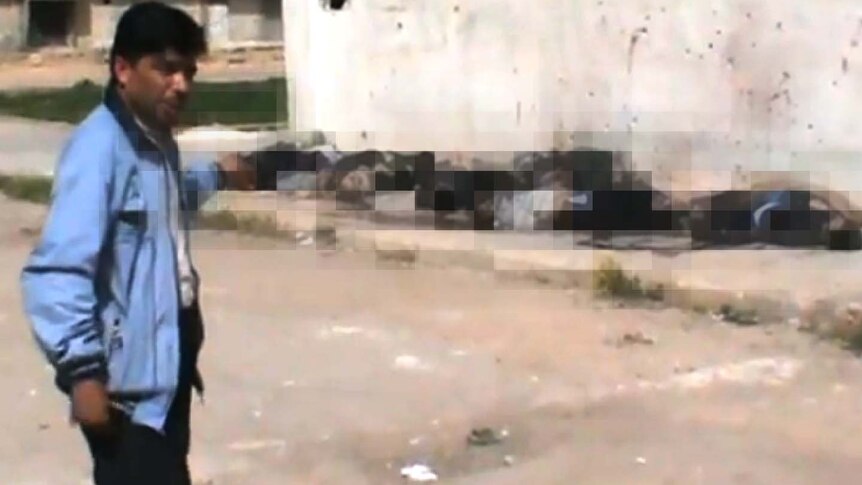 Over a dozen men who appear to have been executed in the Syrian city of Homs