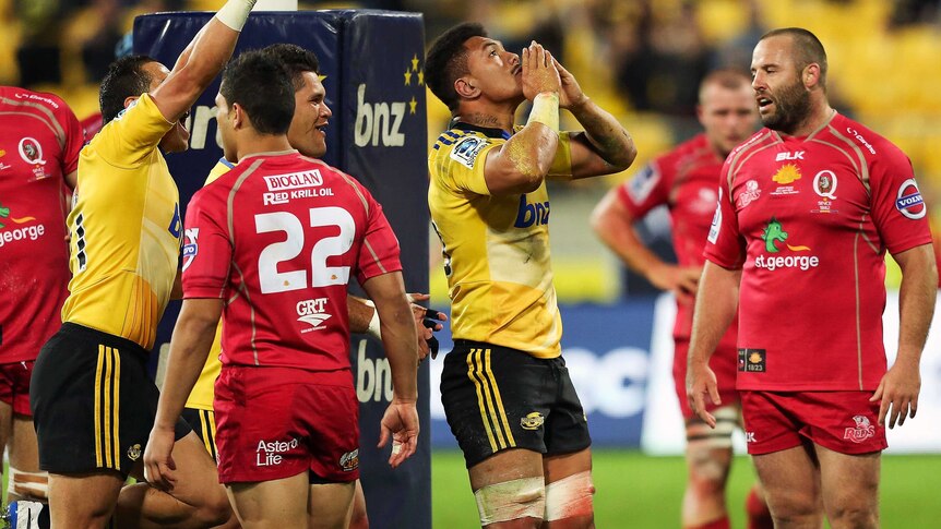 The Hurricanes' Ardie Savea celebrates a try against the Reds in Wellington.
