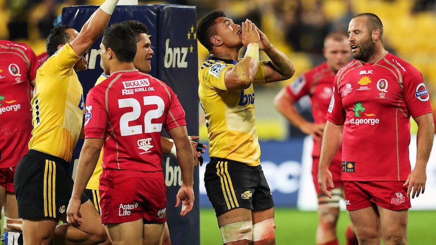 The Hurricanes' Ardie Savea celebrates a try against the Reds in Wellington.