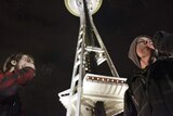 Seattle residents light up under the city's iconic Space Needle after the law came into effect.