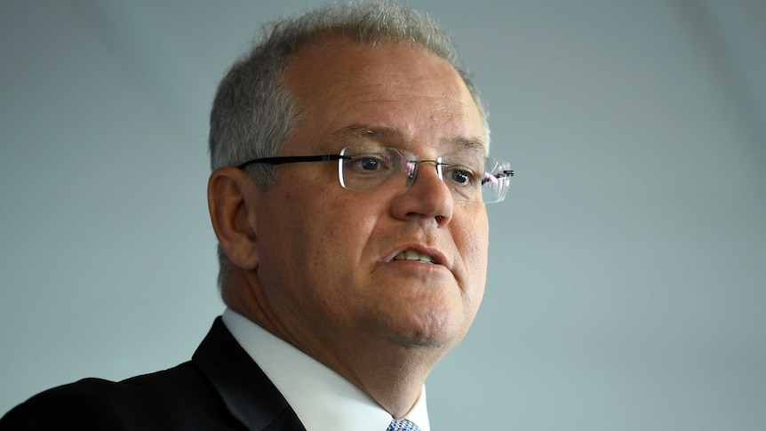 A side-on shot of Scott Morrison speaking.