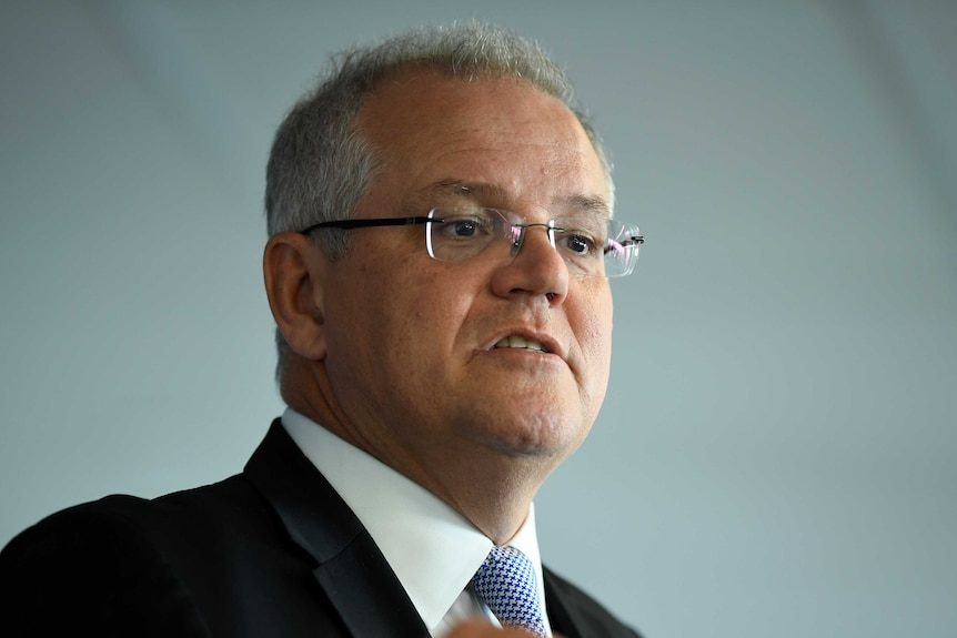 A side-on shot of Scott Morrison speaking.