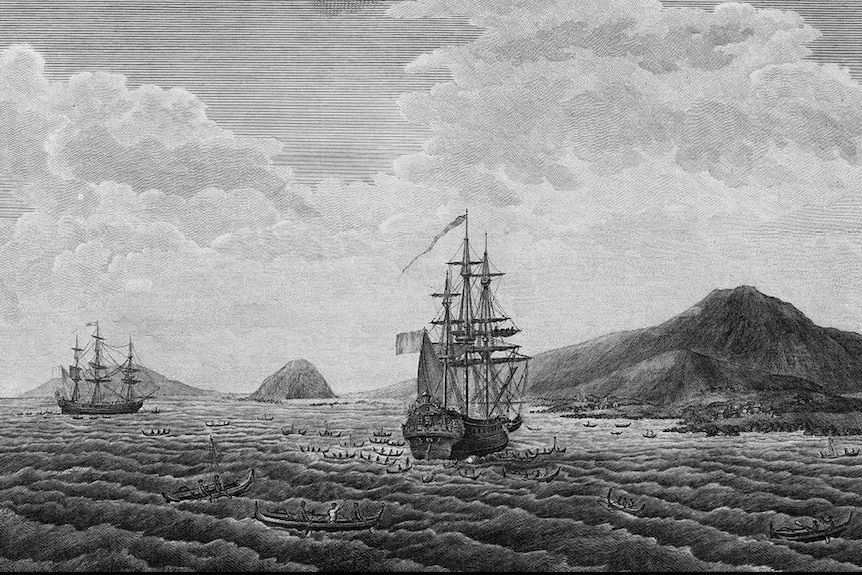A black and white illustration of two 1700s ships near islands.