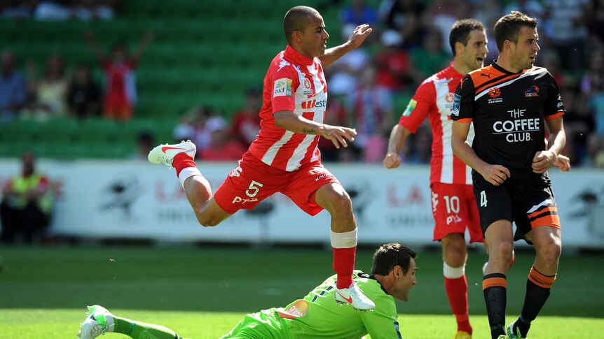 Fred scores the Melbourne Heart's third goal against Brisbane Roar at AAMI Park.