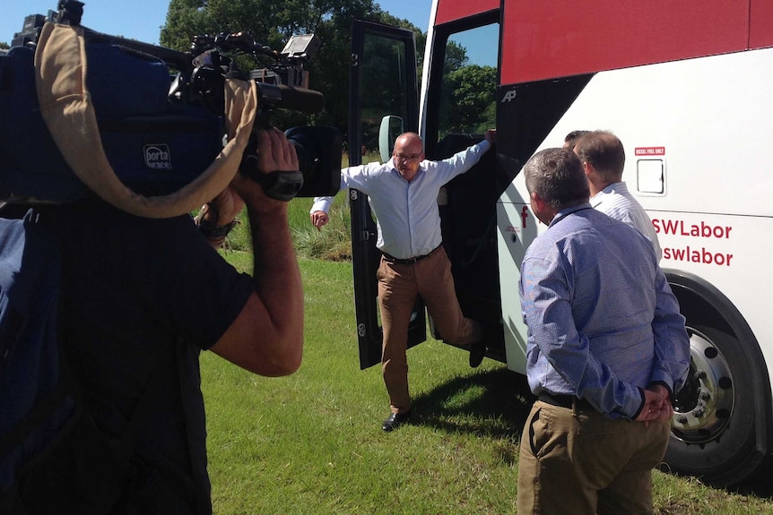 Luke Foley hops off his campaign bus