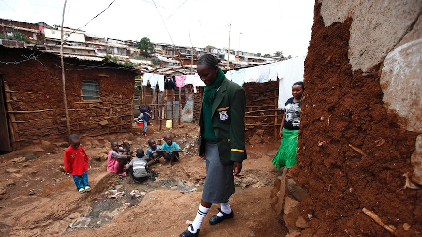 Kenyan schoolgirl walks home