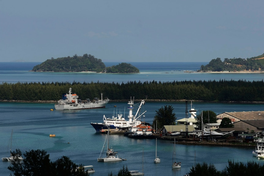 A view of a port with ships docked.