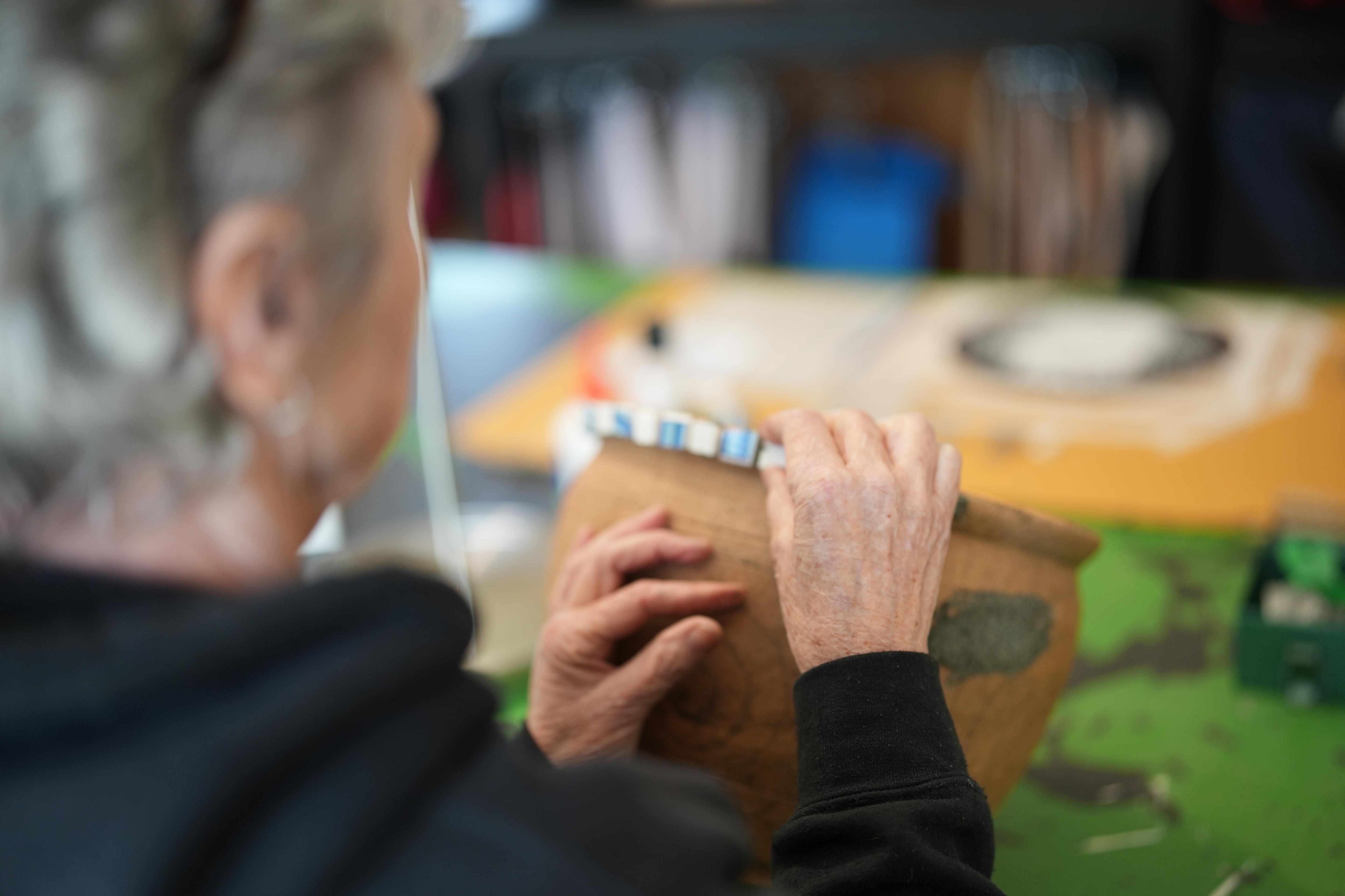 Crackpot 1 working on a mosaic creation
