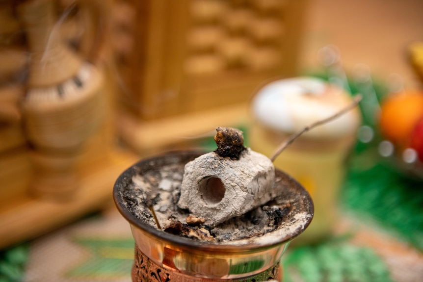 A close-up of an ornament at an Ethiopian New Year celebration event.