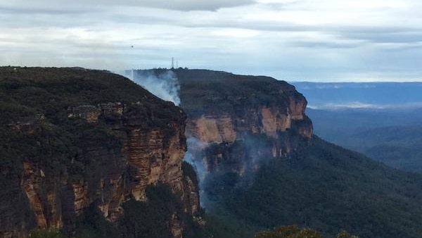 Smoke coming from an escarpment in the Blue Mountains.
