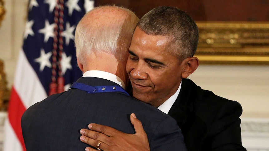 Barack Obama shares a moment with Joe Biden after presenting him the Presidential Medal of Freedom.