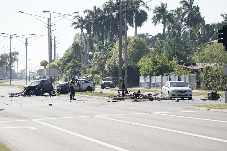 Two cars are seen smashed at the scene of a fatal collision in Alawa.