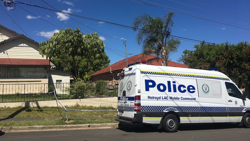 police van out front of house