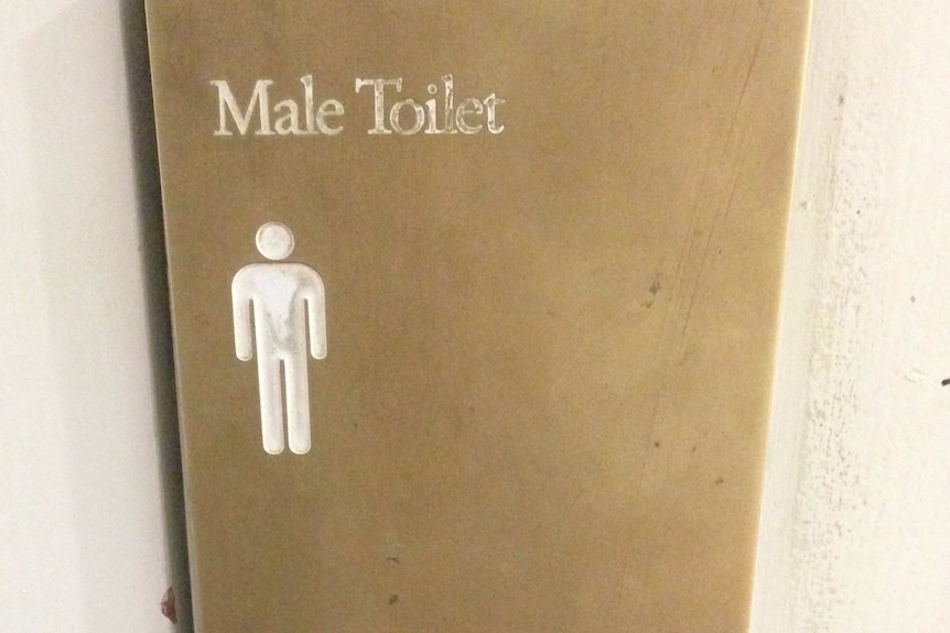 A sign for a men's toilet