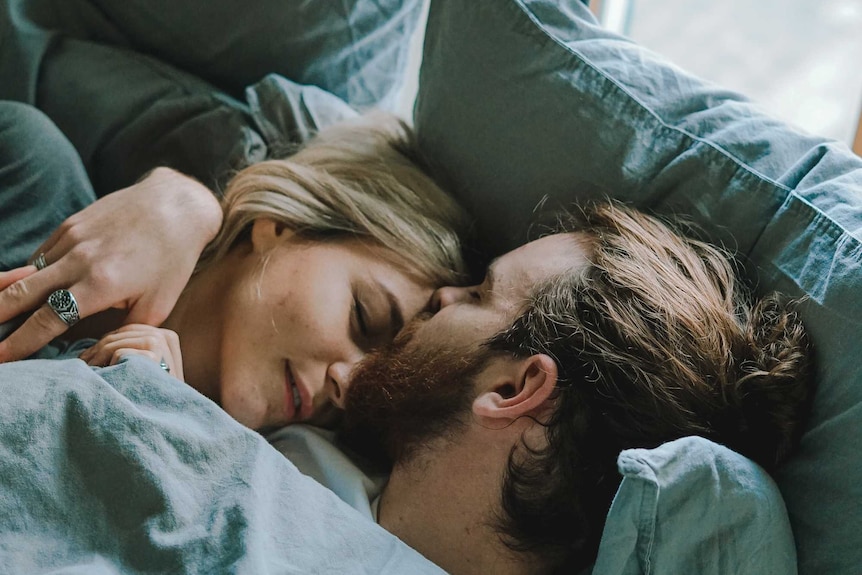 Couple in bed together