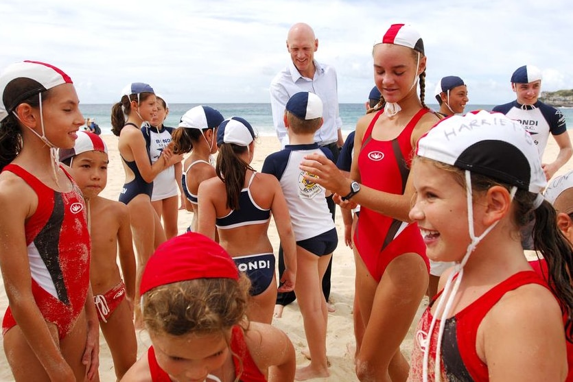 Peter Garrett talks to nippers at Bondi Beach