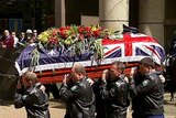 The coffin of Constable William Crews is carried into Sydney's St Andrews Cathedral