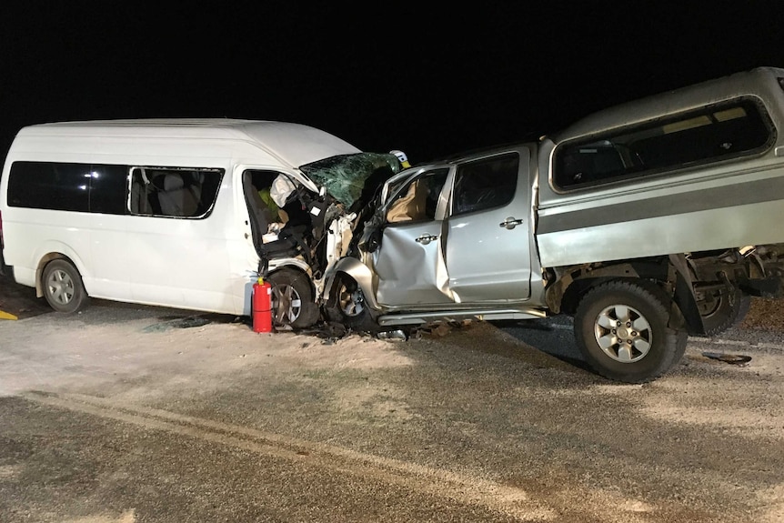 A crash involving a white mini bus and a silver ute, north of Perth