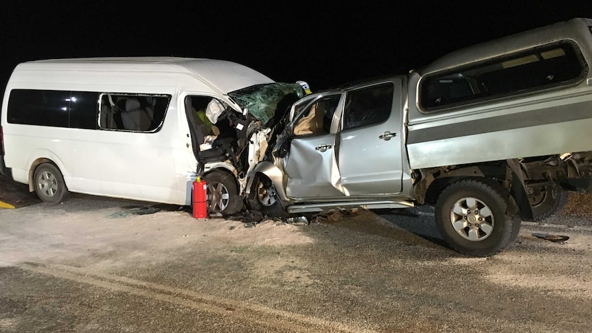 A crash involving a white mini bus and a silver ute, north of Perth