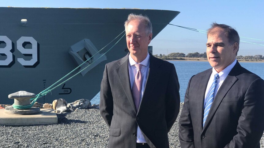 Austal's David Singleton and ASC chief Mark Lamarre in front of Air Warfare Destroyer Hobart