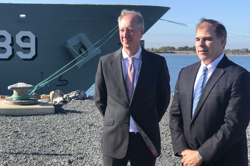 Austal's David Singleton and ASC chief Mark Lamarre in front of Air Warfare Destroyer Hobart