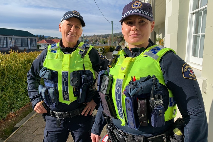 Two women police officers on a street