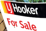 LJ Hooker sign outside a house.