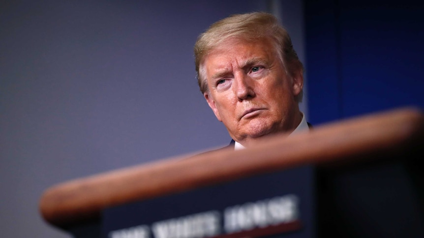 President Donald Trump listens during a briefing about the coronavirus