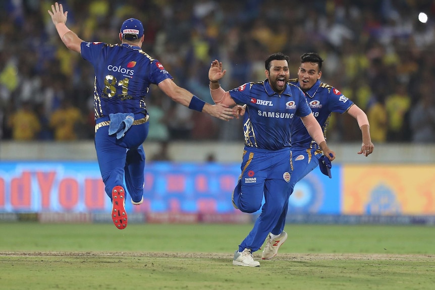 Mumbai Indians captain Rohit Sharma and teammates celebrate their IPL final win