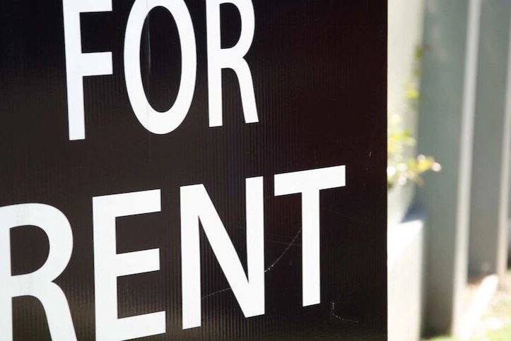 A for rent sign you would see outside of a rental property.