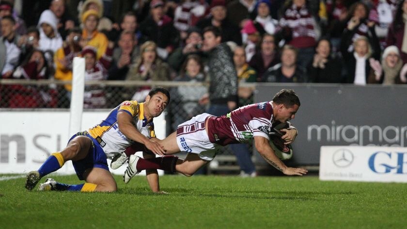 Anthony Watmough dives over the line