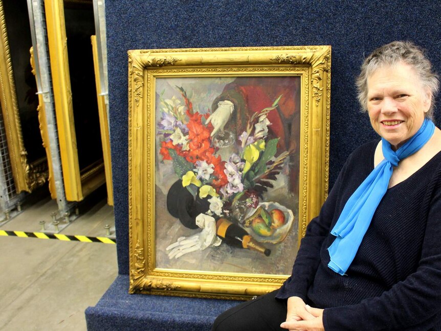 NGA senior curator Dr Anna Gray with George Lambert's painting The empty glass 1930