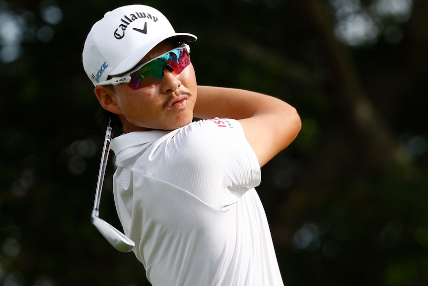 Min Woo Lee plays a tee shot at PGA Tour event in Florida.