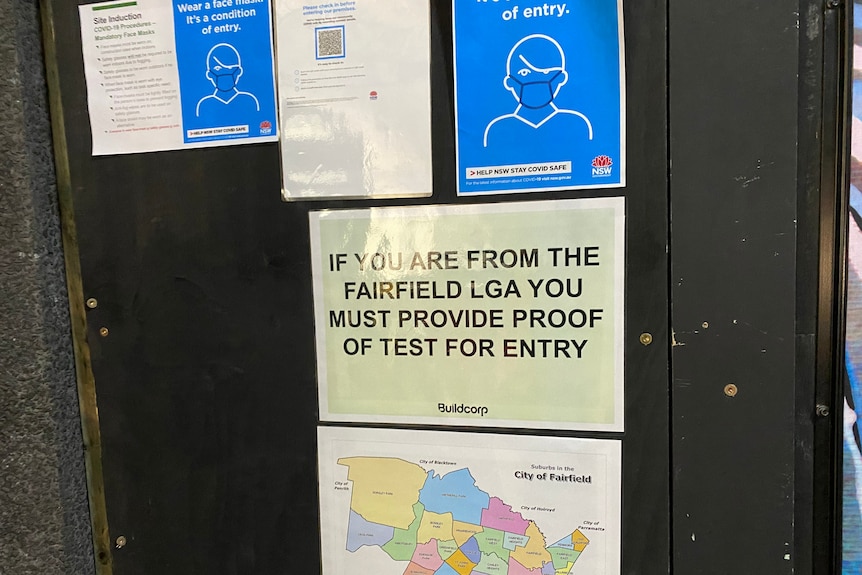 A sign telling workers they need to get tested if they live in the Fairfield local government area. 
