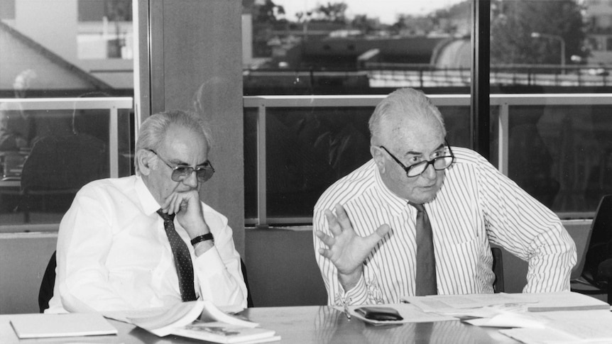 Former prime minister Gough Whitlam sits at a language meeting.