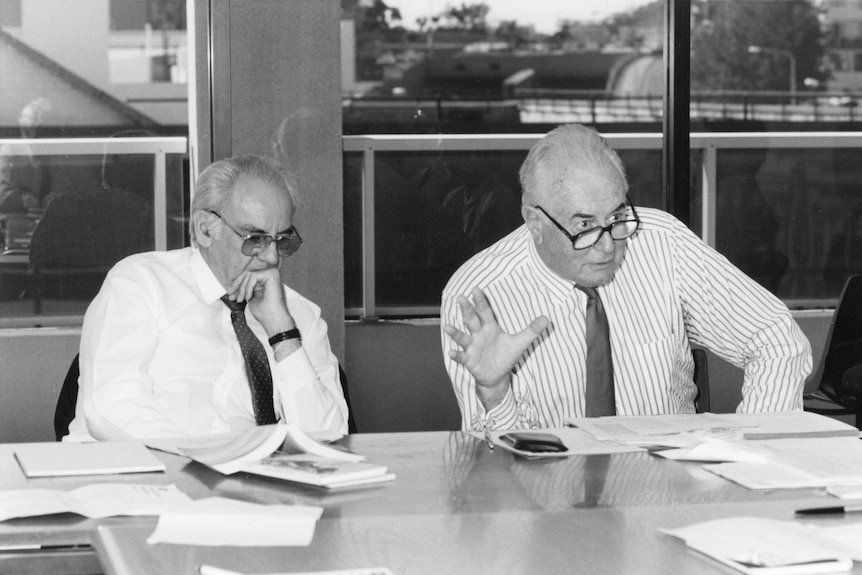 Former prime minister Gough Whitlam sits at a language meeting.