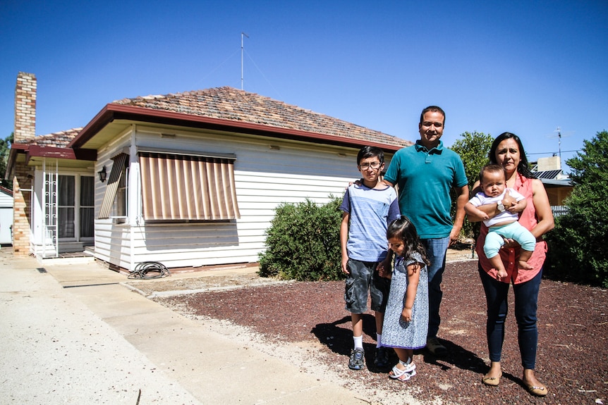 Qualified vets in Columbia, Guillermo Sierra Cespedes and his wife Magda Liliana Medina and their three children at their home.